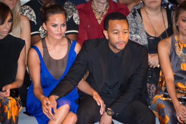 Chrissy Teigen and John Legend hand by hand Chrissy Teigen and John Legend hand by hand