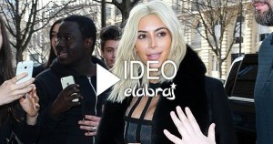 Kim Kardashian squeezes herself into cage dress