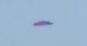 Purple UFO Filmed Hovering Above City Of Lima in Peru